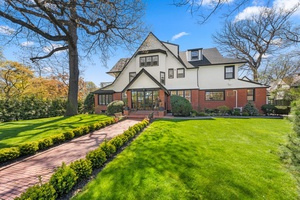 Gated Colonial Revival Dream Home with Carriage House Studio and Garage