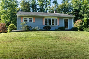 Meticulously maintained Ranch home situated on a beautiful professionally landscaped setting.