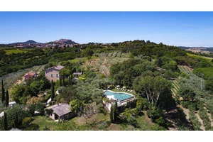 Tuscany real estate. Farm with ancient villa for sale in Montepulciano. Manor with old wine cellars, gardens, vineyards, olive groves, gorgeous pool
