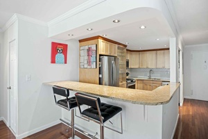 MOVE IN READY ! This one of a kind, south facing extra large one bedroom offers an abundance of sunlight and views downtown including the Freedom Tower !