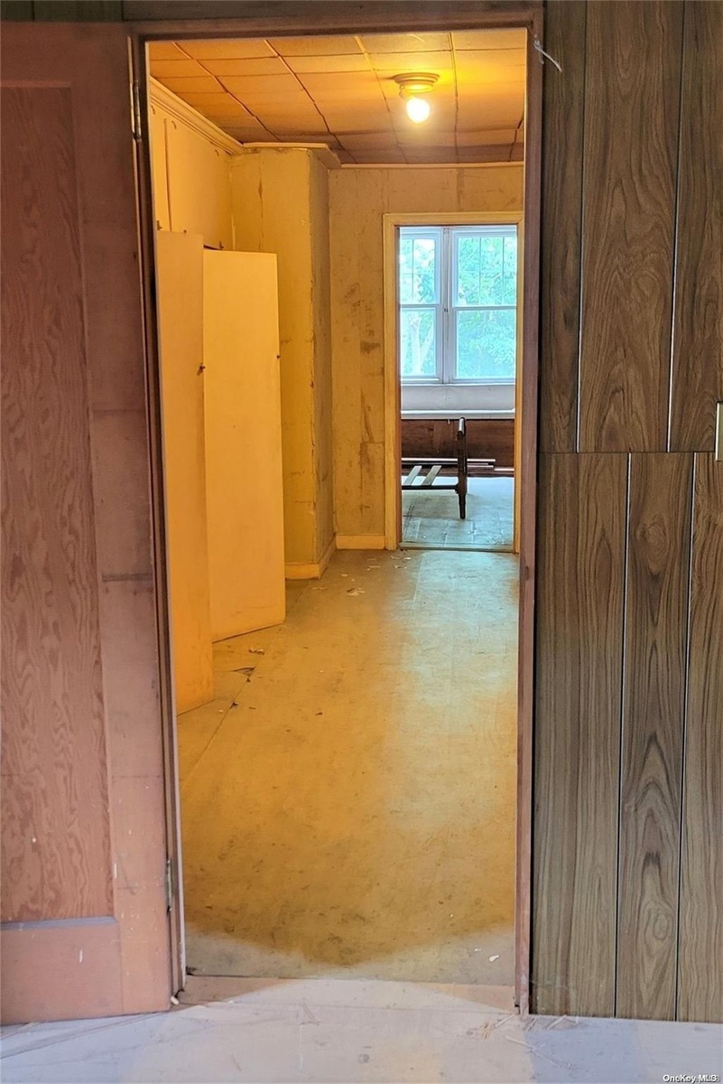 Hallway With Storage Closets