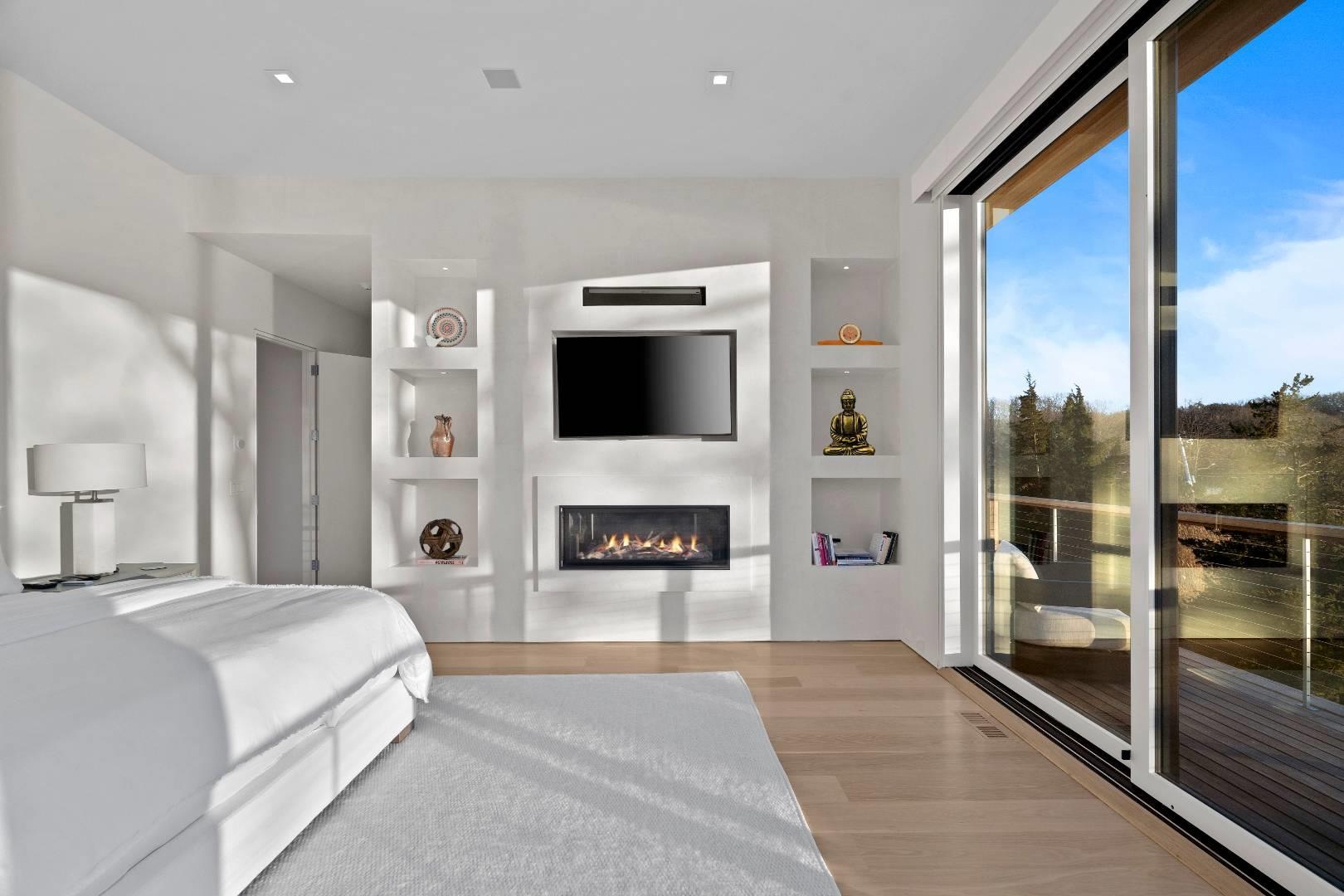 Bedroom with access to exterior and light hardwood / wood-style flooring