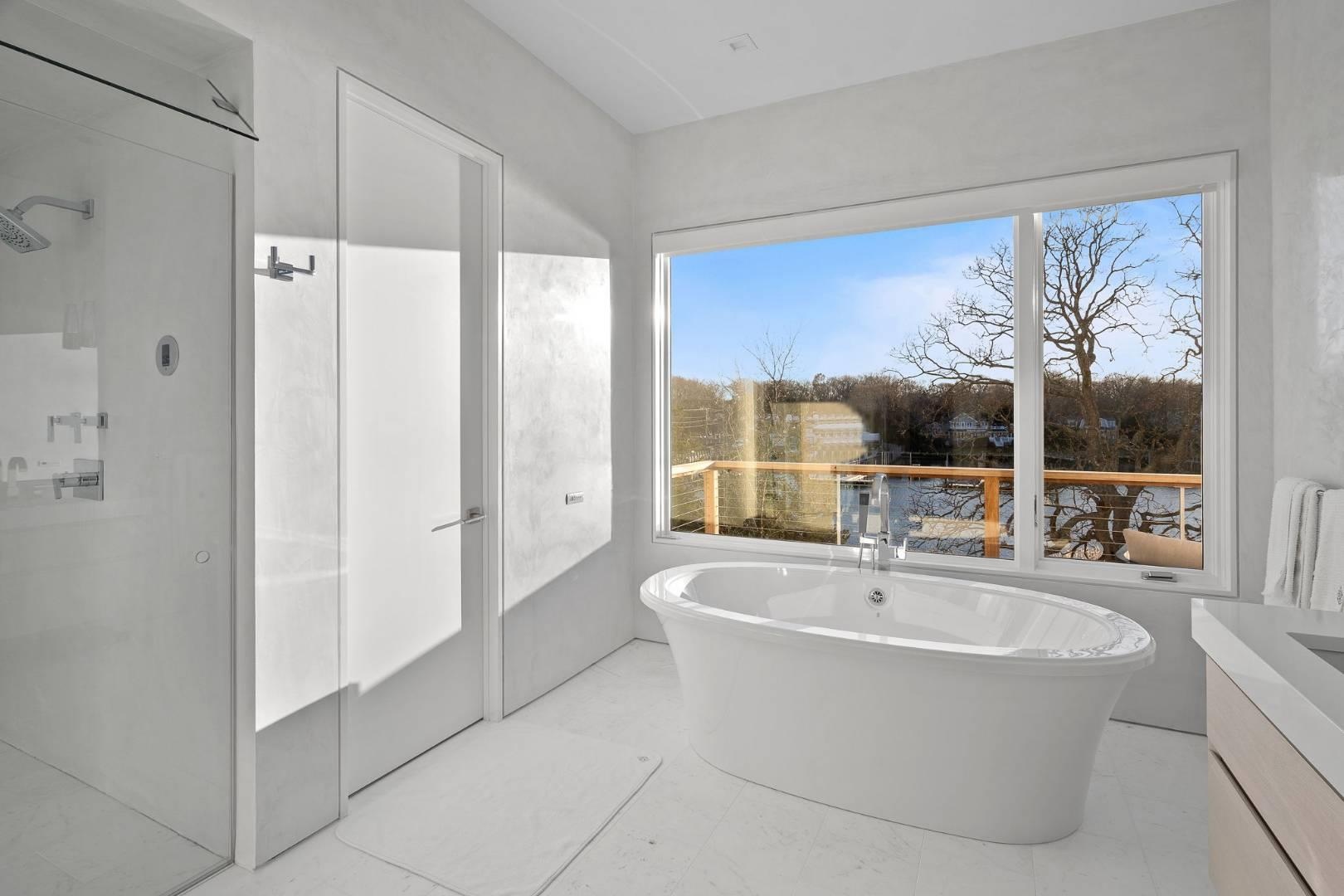 Bathroom with vanity and a tub