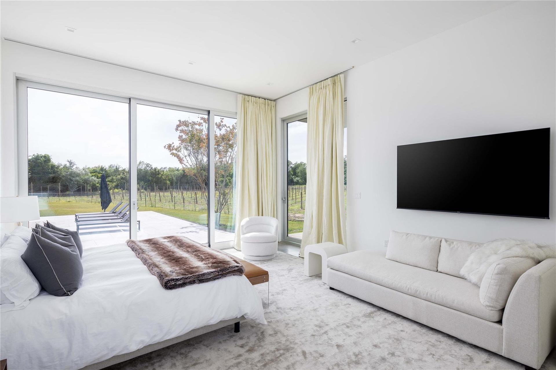 Bedroom featuring access to outside and carpet floors