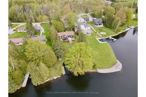 Come Experience The Kawartha Lakes With This Spacious 4 Season Waterfront Home on Mitchell Lake With Direct Access to Balsam Lake on the Trent Waterway System with Endless Boating.