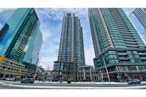 Welcome to Gibson Square Stunning 2 bedroom, 2 bathroom corner unit in the heart of North York, offering 856 sq.