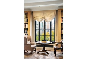 This enchanting duplex is notably one of the very few residences in the United States designed by renowned Belgian designer, Axel Vervoordt.
