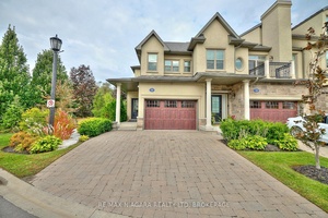 This gorgeous 2 bedroom, 3 bath luxury end unit townhouse features exquisite high end finishes, TWO balconies, a fully finished basement with a walk out to the patio with exclusive ...