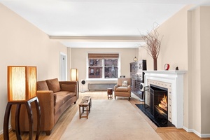 Move right in to this south facing, prewar convertible three bedroom, three full bath home with wood burning fireplace just steps off Third Avenue on the Upper Eastside of Manhattan.