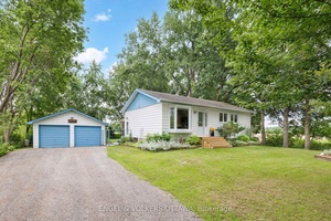 This charming Carlsbad Springs bungalow may be small in size but big on perks !