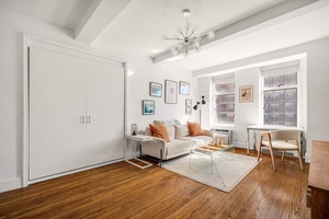 London Terrace Studio with hardwood floors and Eastern exposure with great light.