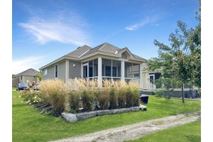Welcome to 63 Butternut Lane, a bright and inviting two bedroom, two bath cottage in The Meadows area of East Lake Shores, a gated, seasonal resort community on the shores ...