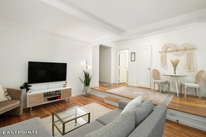Spacious split level studio in the famed Emory Roth designed Kensington House in prime Chelsea featuring Art Deco charm, this cheerful residence boasts beamed ceilings, a sunken living room, hardwood ...