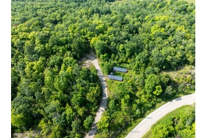 Located in one of eastern Ontario's premier waterfront communities and situated between Bobs Lake and Crow Lake, sits this 9 acre lot that is ready for your designs and dream ...