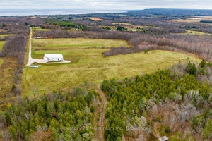 Truly Stunning Contemporary Retreat with Panoramic Views of Georgian Bay, Forest and Escarpment.