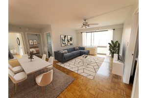 Step into the luxurious embrace of Apartment 503, a spacious three bedroom, two bathroom haven boasting an impeccable layout and east west exposures.