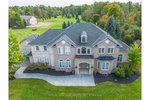 Welcome to this exquisite custom built home, nestled in a private estate of Brookville on a stunning 5 acre property, offering over 6, 000 square feet of luxurious living space.