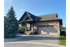 This stunning bungalow is 'The Palmer' model from eQuinelle's 'The Legends' Bungalow Series and offers 1, 580 square feet of luxurious living space.