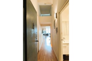 Priced to sell ! Welcome home to your oversized studio loft with 12 ceiling, oversized window, and spiral staircase to a cozy queen sized bed sleeping loft area.