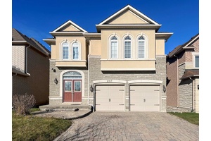 MUST SEE ! This Luxury Property Was Former Model Home, In Upgrades Shows Great W Stone Exterior, Mature Landscaping, Interlocking Walk Way Patio.