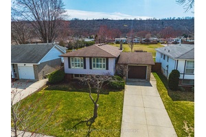 Tucked in a quiet cul de sac in beloved Stoney Creek, this 3 bedroom 2 full bath detached raised ranch is the kind of home families dream about.