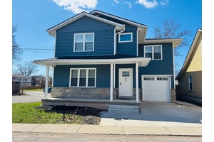 Move in ready ! Four year old custom built home filled with light, character amp ; space.