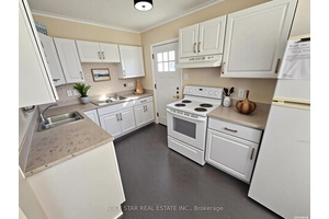 Attention investors ! Excellent, turn key, cash flowing, licensed rental property with 2 self contained units.