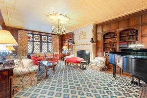 Enter this grand Classic 9 home off of a semi private landing into a 30 foot long gallery that provides discrete separation between the public and private spaces.