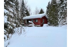 Opportunity knocks ! Check out this 2 bed 1 bath, 3 season cottage with open concept layout.