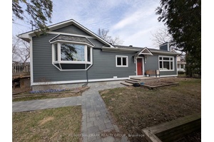 Stunning Custom Bungalow in Coveted Britannia Village Experience the perfect blend of modern elegance and artistic charm in this beautifully reimagined custom bungalow, ideally located just steps from the water ...