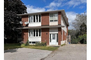 Sunny, high Ceiling basement with a walkout to private yard.