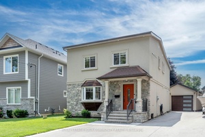 FAMILY LIVING BESIDE QUEENSWAY PARK gt ; Welcome to 30 Smith Crescent, a beautifully updated family home offering over 2, 800 sq ft of finished living space in one of ...