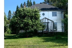 Welcome to 1723 Lucy Street, a character rich century home located in the heart of Richards Landing, where small town warmth meets scenic island living.