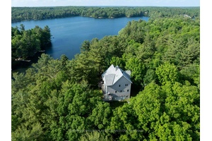 Live the Cottage Lifestyle All Year Round Waterfront Luxury on Buck Lake.