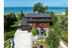 Waterfront Collingwood. Large extensively landscaped waterfront property in Collingwood, approximately 100 feet of frontage and features a 3 bedroom, 2.