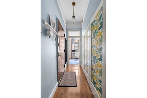 Apartment 1A is a beautifully renovated 2 bedroom, 1 bath maisonette located in an intimate prewar Beaux Arts co op on a quiet, tree lined block.