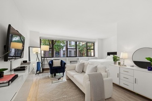 Bright and spacious alcove studio with a Northern exposure, overlooking the beautiful townhouses on East 36th Street.