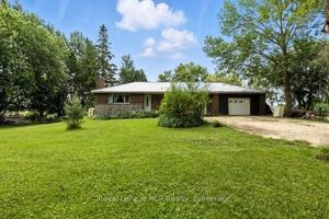 Tucked away on a peaceful 3 4 acre lot, this 3 bedroom bungalow offers country living without the fuss.