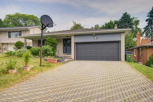 Step into this beautifully renovated backsplit detached home with a double garage and spacious driveway, perfectly situated in the highly coveted Trail area of North York.