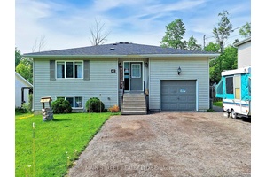 This well maintained raised bungalow, built in 2001, is located on a spacious, fully fenced lot, offering plenty of privacy with no homes directly across.