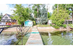 Welcome to your lakeside on beautiful Lake Simcoe, tucked away on the quiet, dead end street of Simcoe Blvd awaiting your personal touches.