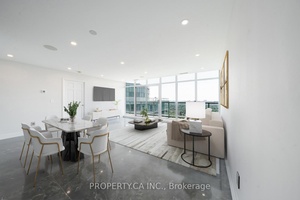 Welcome to this fully renovated, show stopping corner penthouse, a true masterpiece floating above the city.