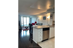 Clean amp ; Bright 1 Bedroom Den with 2 Full Bathrooms and 2 Parking's !