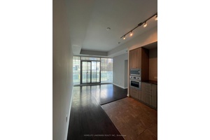 Stunning 1 Bedroom Den Unit with Parking and Locker at Ice II.