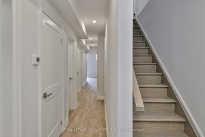 Stunning, newer 3 bedroom, 1 and a half bath, lower level unit, fully renovated, with custom cabinetry, quartz counters, Stainless steel appliances and beautiful laminate floors.