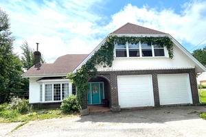 Stunning Tudor Style Home on Nearly 2 Acres in Hare Bay, NL A Nature Lovers Paradise !
