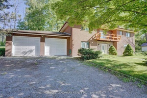 25 Acres Maintained Raised Bungalow with Huge Lot.
