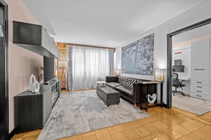 This thoughtfully designed two bedroom, two bathroom home offers a flexible layout, warm details and an unbeatable Midtown East location.