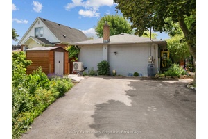 A COTTAGE IN THE CITY Welcome to 309 Southill Drive, a nature lovers paradise with urban convenience in the heart of Kitchener.