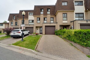 Centrally located 4 bedroom townhome backing onto Dearbourne Park.